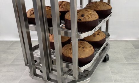MAXROTOR trays on an oven rack with an inverting system